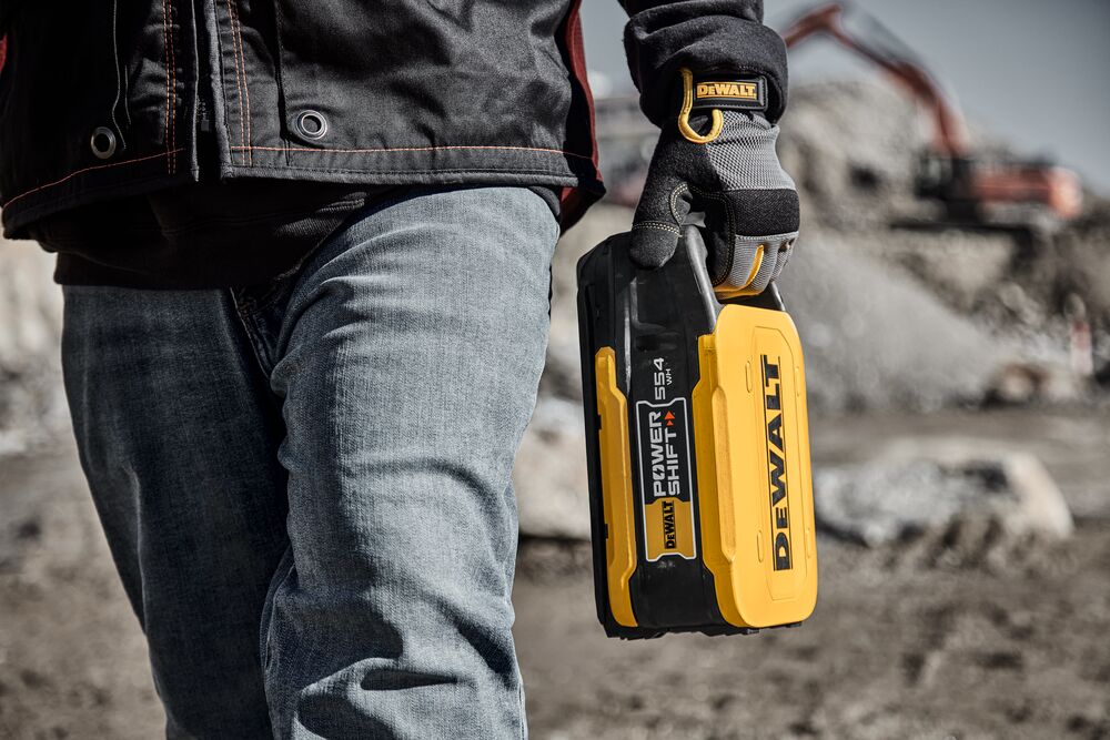 Man carrying POWERSHIFT battery
