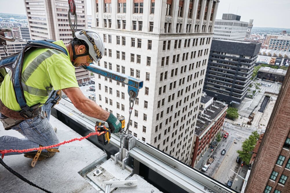XR impact driver being used by a construction worker XR impact driver being used by a construction worker
