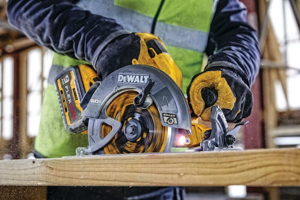 Close up of FLEXVOLT brushless cordless circular saw with brake kit in action. Close up of FLEXVOLT brushless cordless circular saw with brake kit in action.