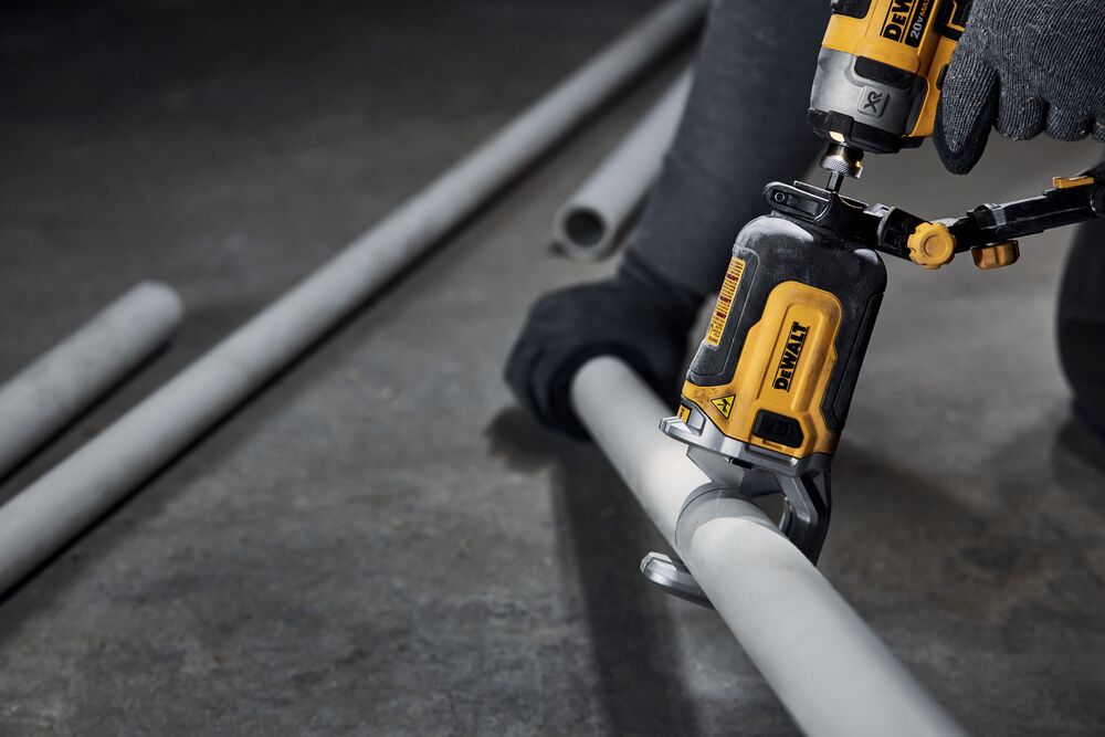 End user using DEWALT IMPACT CONNECT PVC/Pex Cutter attachment on Impact Driver to cut PVC pipe. End user using DEWALT IMPACT CONNECT PVC/Pex Cutter attachment on Impact Driver to cut PVC pipe.